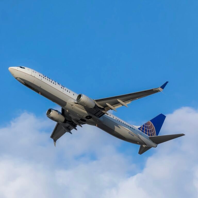 An airplane flying in the blue sky